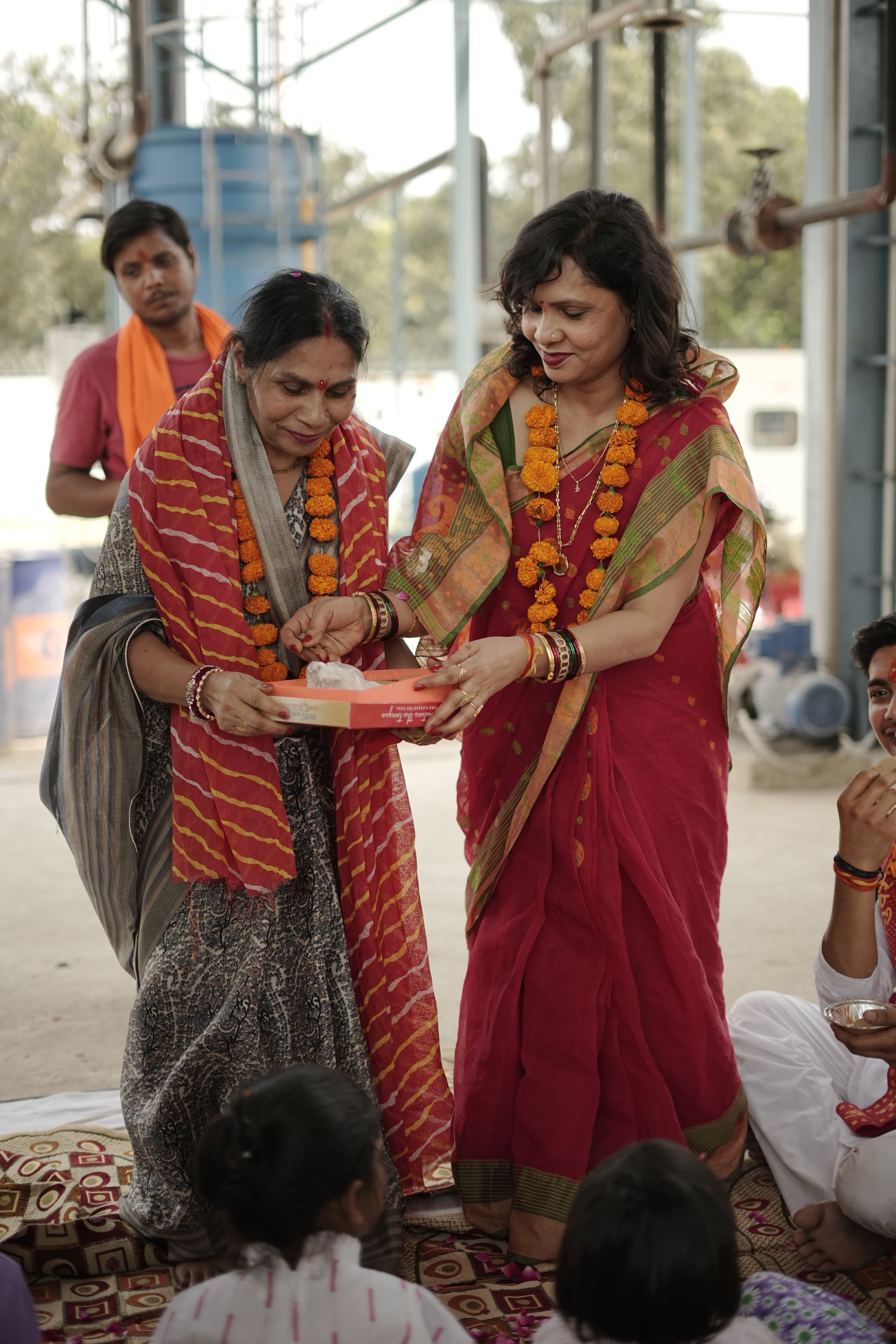 Ritual Offering by Female Guests Image